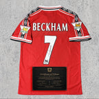 David Beckham 1999 Signed Tribute Jersey | Manchester Red Treble Kit — printed signature tribute football shirt
